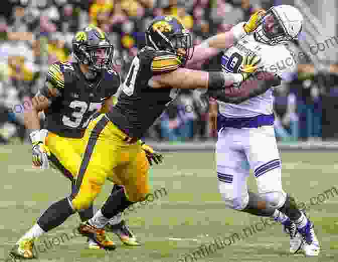 A Close Up Shot Of Two Iowa Hawkeyes Offensive Linemen Battling In The Trenches Tales From The Iowa Hawkeyes Sideline: A Collection Of The Greatest Hawkeyes Stories Ever Told (Tales From The Team)