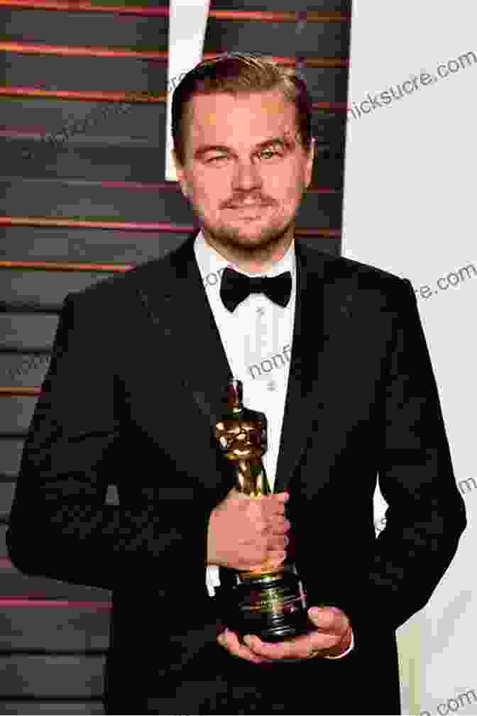 A Person Holding An Oscar Award Representing Fame And Recognition Against The Idols Of The Age