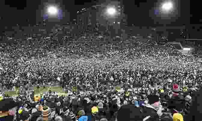 Iowa Hawkeyes Football Players Celebrate A Victory On The Field Tales From The Iowa Hawkeyes Sideline: A Collection Of The Greatest Hawkeyes Stories Ever Told (Tales From The Team)