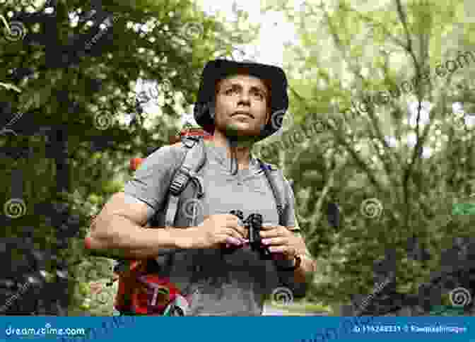 William Wasserman Standing In A Forest, Holding A Pair Of Binoculars And Looking Determined Poacher Hunter William Wasserman